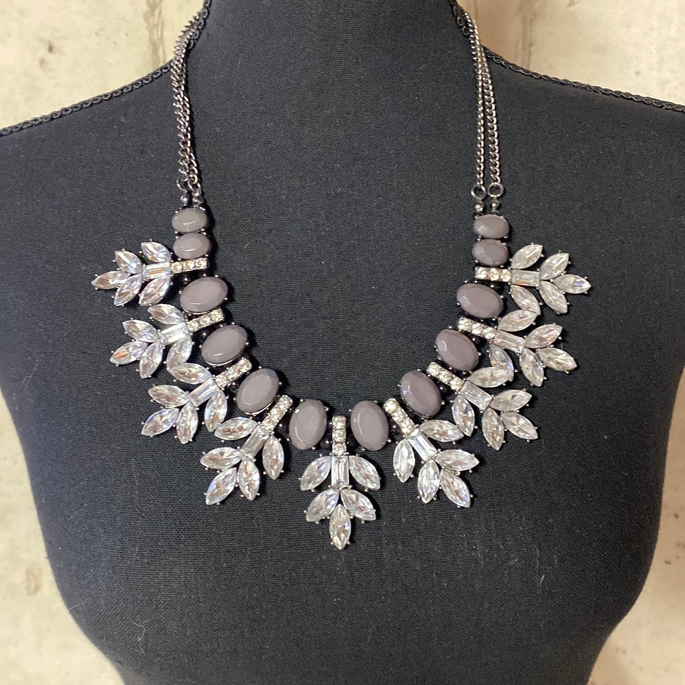 Statement costume necklace rhinestone and grey resin.